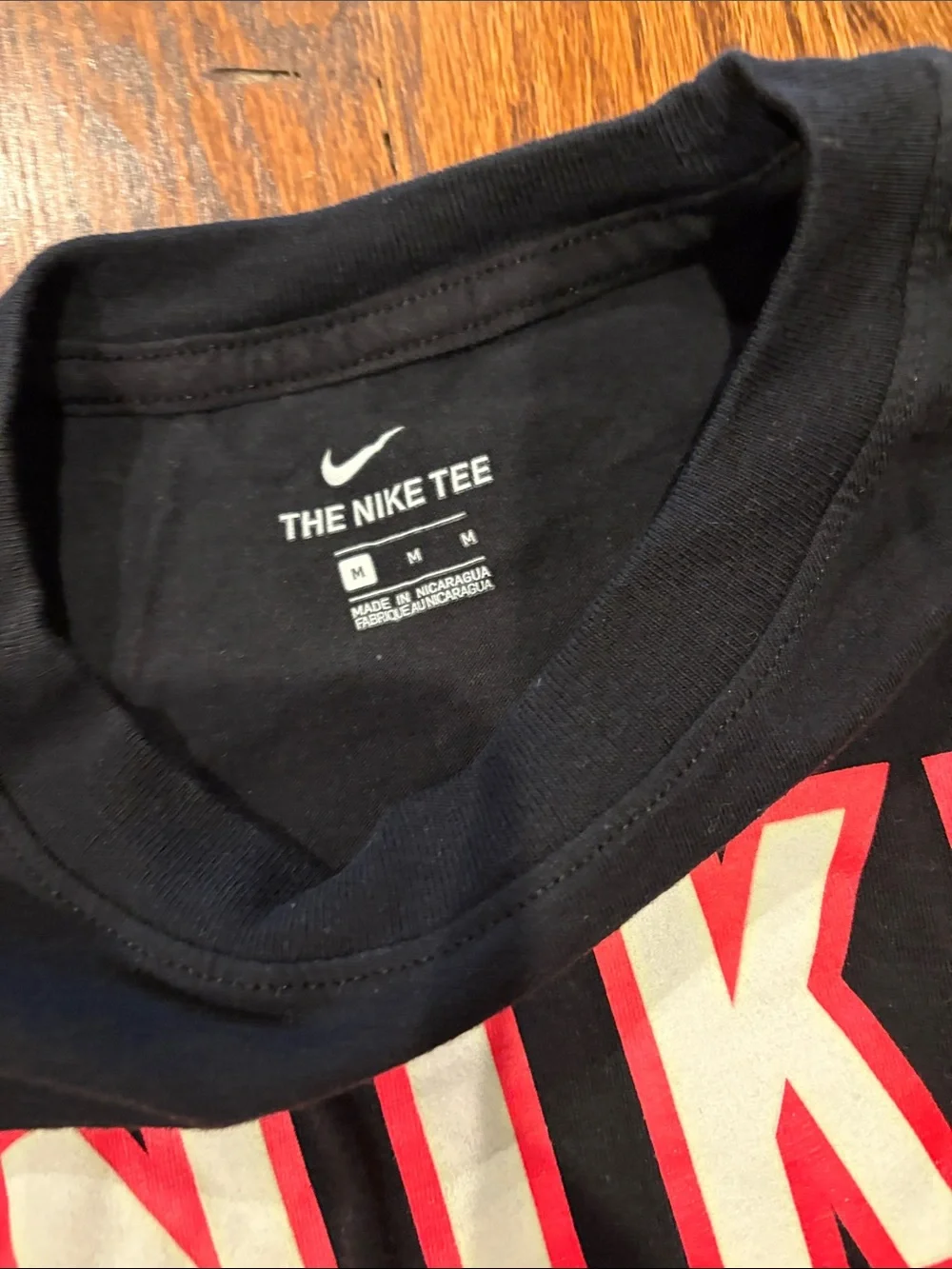 Nike Black Short-Sleeve Tee with Red NIKE Chest Logo